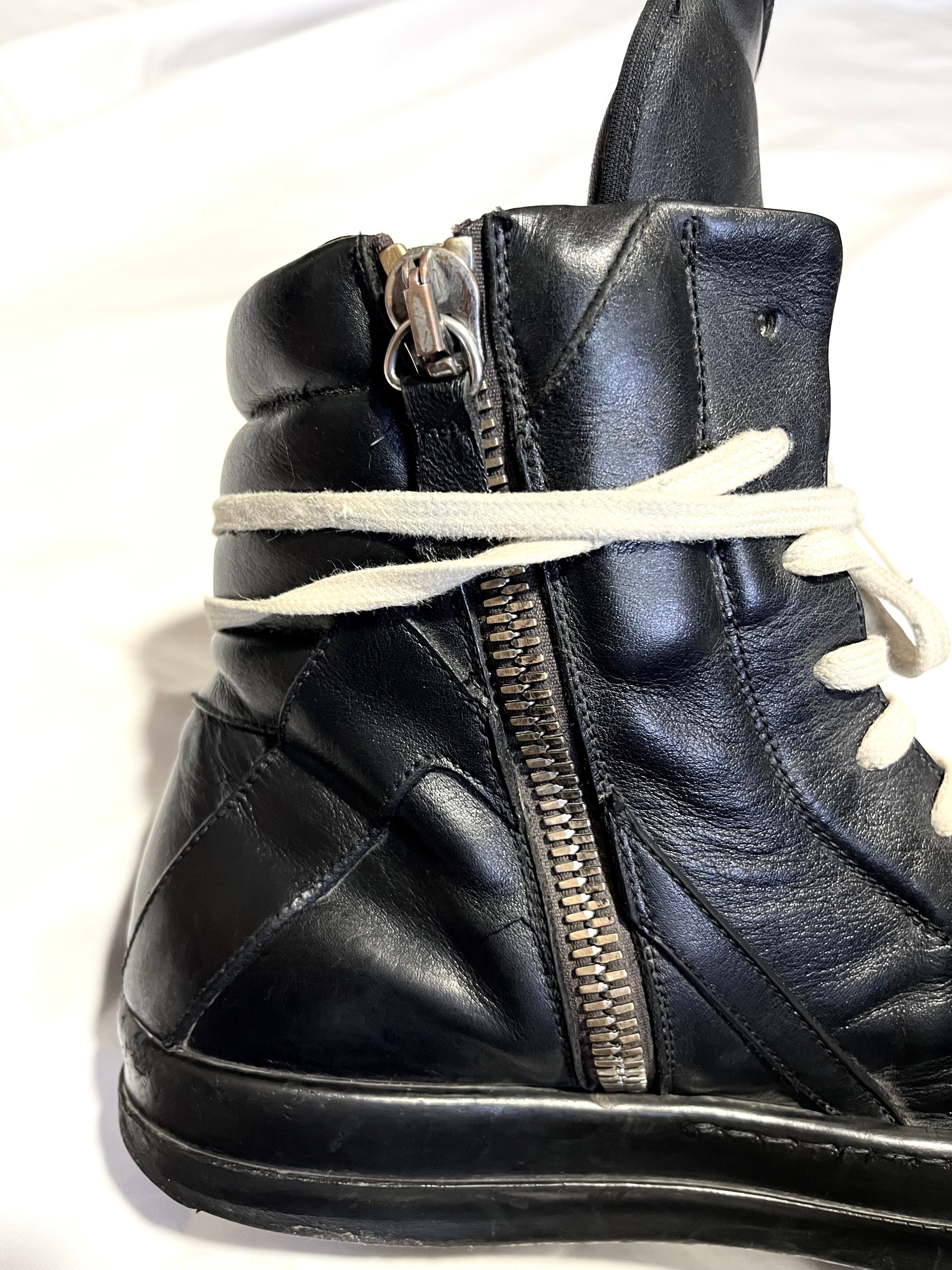 RICK OWENS TRIPLE BLACK LEATHER GEOBASKETS IN 41.5