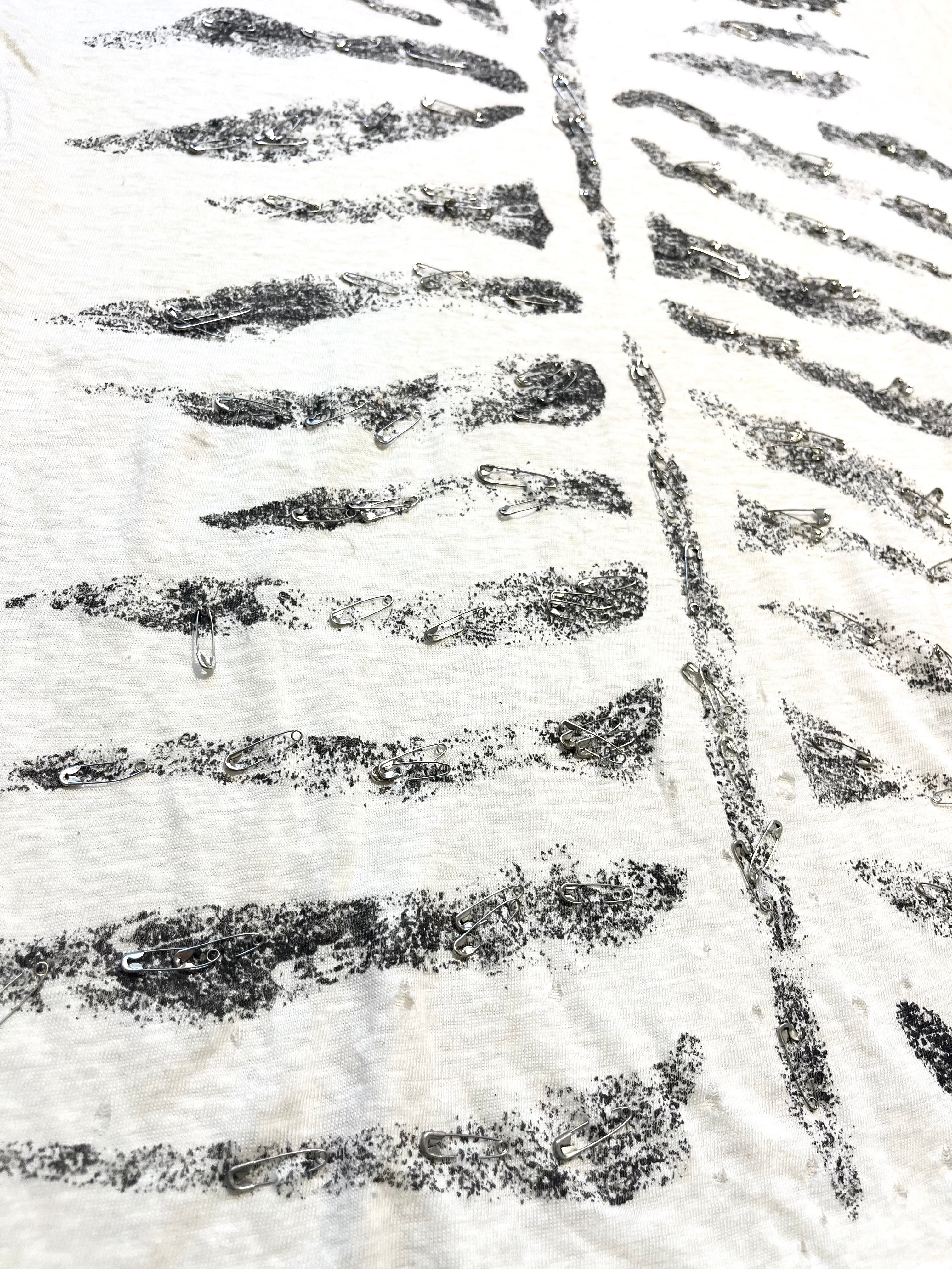 PIERRE BALMAIN "RIBCAGE" DISTRESSED SAFETY PIN T-SHIRT
