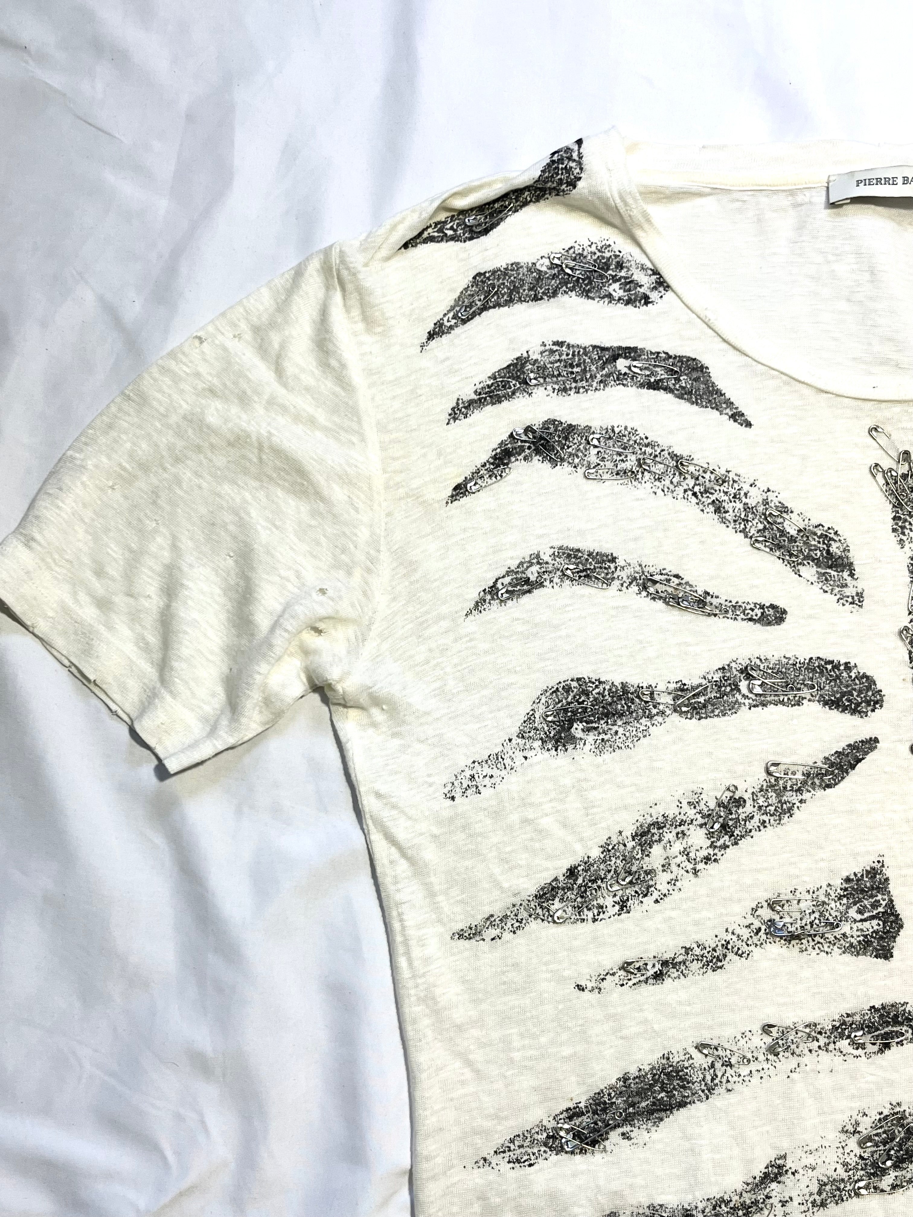 PIERRE BALMAIN "RIBCAGE" DISTRESSED SAFETY PIN T-SHIRT