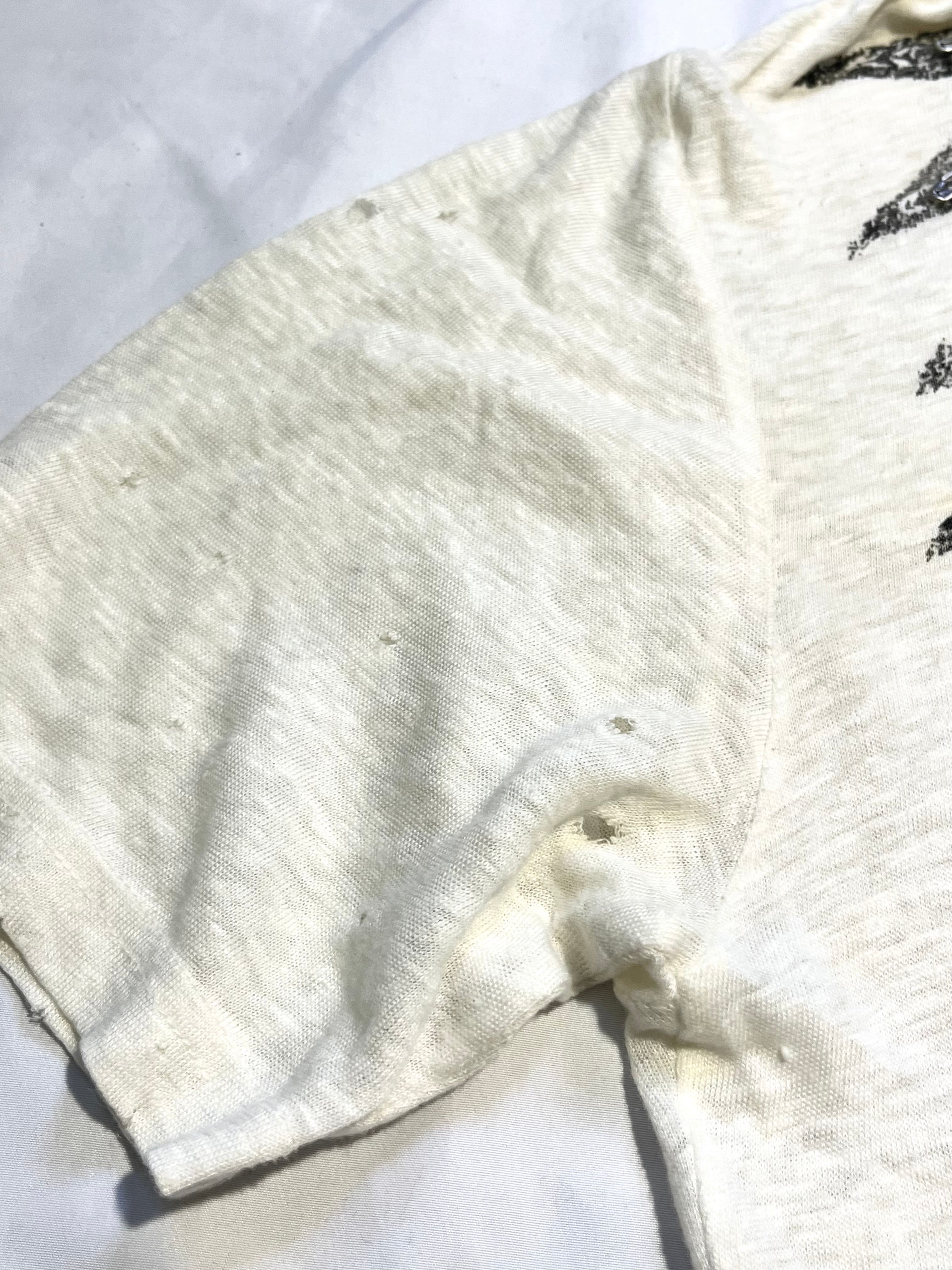 PIERRE BALMAIN "RIBCAGE" DISTRESSED SAFETY PIN T-SHIRT